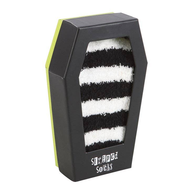 Chaussettes rayées dans un coffret cadeau en forme de cercueil