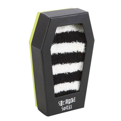 Chaussettes rayées dans un coffret cadeau en forme de cercueil